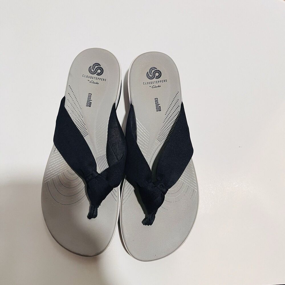 Woman’s Clarks Cloud steppers flip flops navy blue size 10